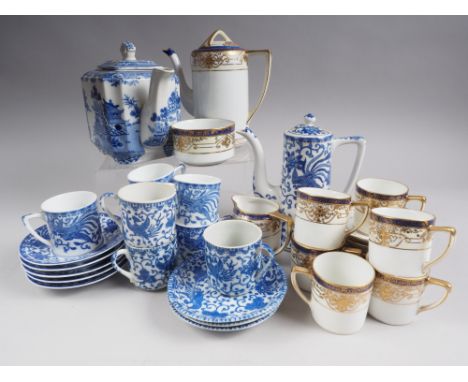 A Noritake porcelain blue and gilt decorated part coffee set, a phoenix decorated part coffee set and a blue and white teapot