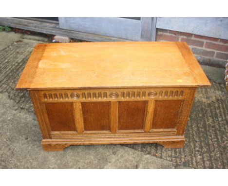 A light oak blanket box with four-panel front, 36" wide x 17" deep x 19 1/2" high 