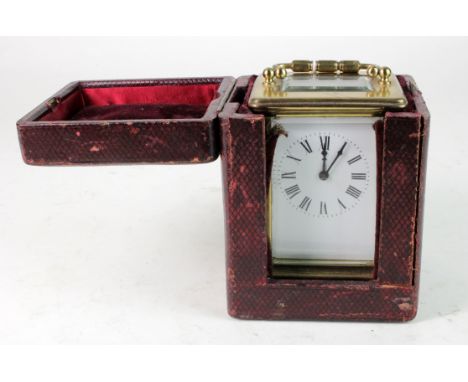 Brass five glass carriage clock, contained in fitted leather case, couple of chips to glass, untested, height 11.5cm approx.