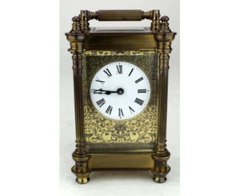 Brass five glass carriage clock, ornately decorated, height 13.5cm approx.