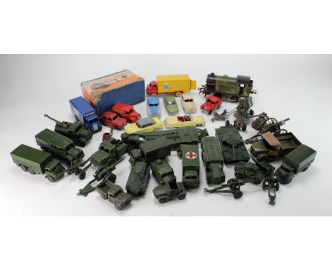 Dinky. A collection of approximately thirty mostly Dinky toys, including Ever Ready Lorry, Heinz Lorry, several Military vehi