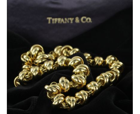Paloma Picasso for Tiffany &amp; Co. 18ct yellow gold knot link necklace. Approx length 44cm and weighing 108.3g.  In a Tiffa