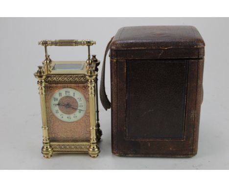 Brass five glass carriage clock, with enamel dial and ornate gilt surround, height 125mm, width 78mm, depth 65mm approx., con