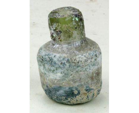 Ancient Roman (ca.200 AD) glass flask with lovely irredesance with some repair 45mm