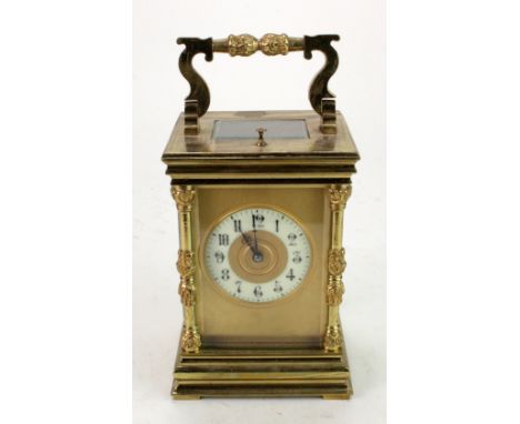 Brass five glass repeating carriage clock, with enamel dial and gilt surround, height 150mm, width 100mm, depth 85mm approx.