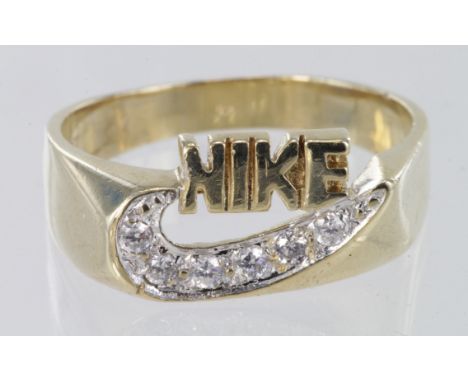 9ct Nike ring set with cz, size W, weight 6.6g