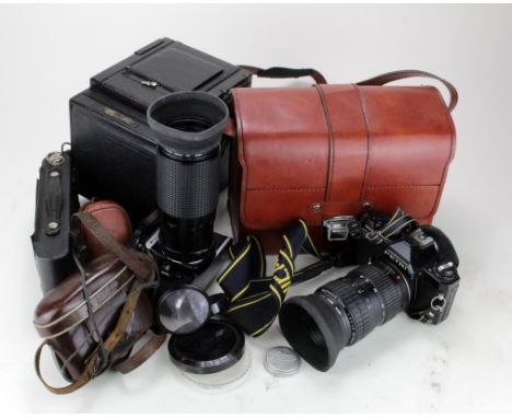 Cameras. A collection of six cameras, comprising an Olympus OM10, Fujica ST605, Petri GX1, Super Paxette, Marion &amp; Co. Ca