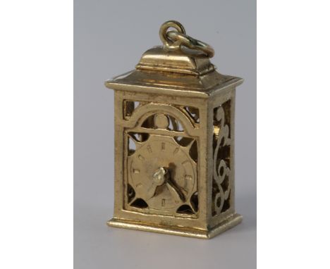 Hallmarked 9ct charm in the form of a carriage clock, total weight 6.9g