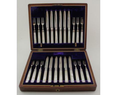 Cased twenty four peice Mother of Pearl silver canteen of fruit knifes and forks. Pristine condition. Allen and Darwin 1907. 