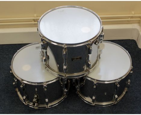 Three Pearl drums, two with Remo Weather King Snare skins, the other with Everplay Extra Parade skin, diameter 37cm approx.