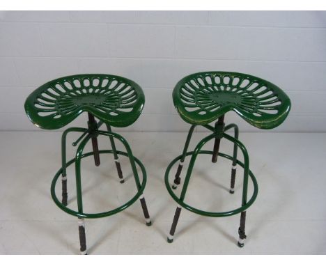 Green painted tractor seat stools