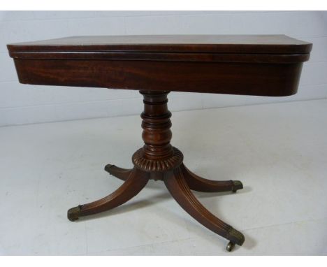 Mahogany folding card table with applied metal fittings to castor feet