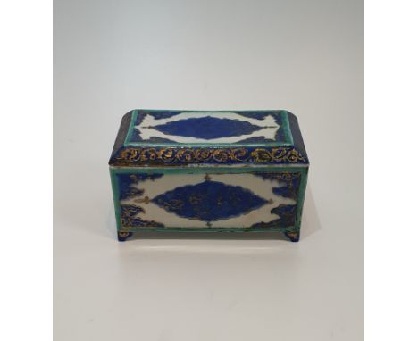 A 19th century Turkish style ceramic blue and green under glazed lidded box. With bold geometric pattern and gilded scrolling
