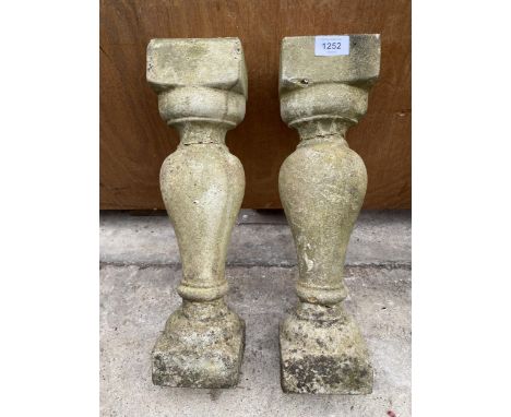 A PAIR OF RECONSTITUTED STONE PEDESTAL PLANT STANDS 