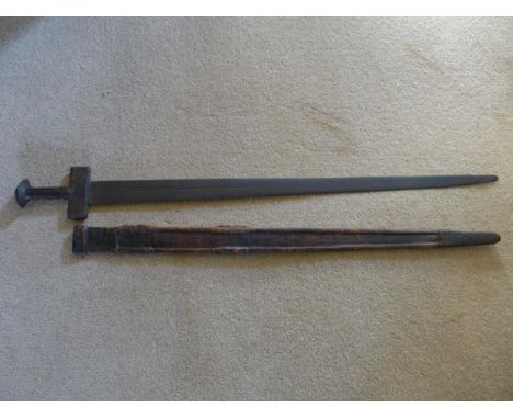 A SUDANESE KASKARA SWORD, 82CM DOUBLE EDGED BLADE, LEATHER GRIP AND SCABBARD 