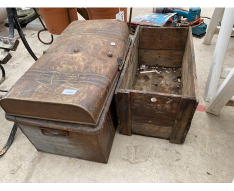 A VINTAGE MONOGRAMED CRATE AND A METAL STORAGE TRUNK 