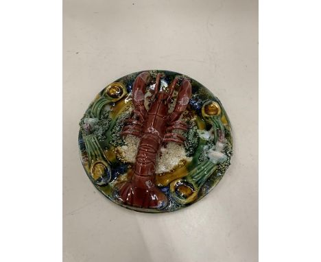A CERAMIC LOBSTER WALL PLAQUE 