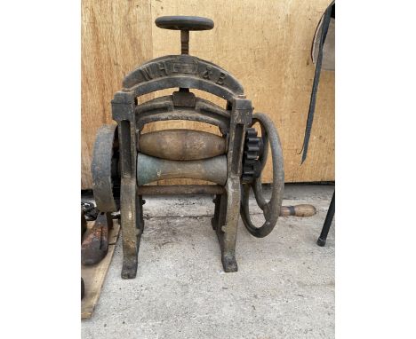 A VINTAGE WHITFIELD HODGSON'S AND BROUGH LTD CAST IRON MANGLE 