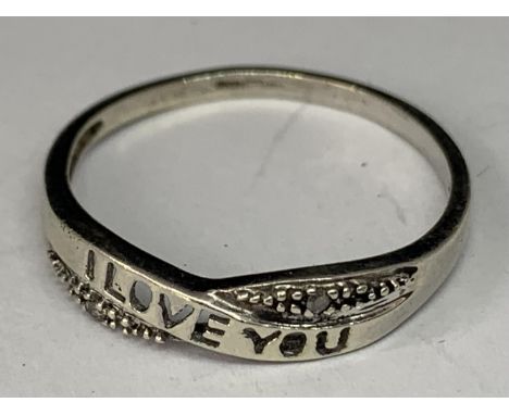 A 9 CARAT GOLD RING 'I LOVE YOU' SIZE O 