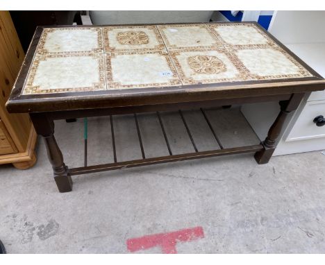 A MODERN TILE TOP COFFEE TABLE 