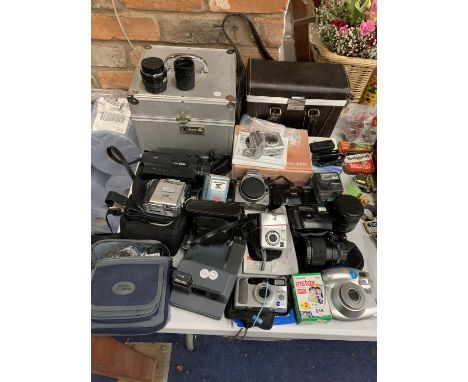 A LARGE COLLECTION OF CAMERAS, LENSES, STORAGE BOXES, ACCESSORIES, VIDEO CAMERA ETC. 