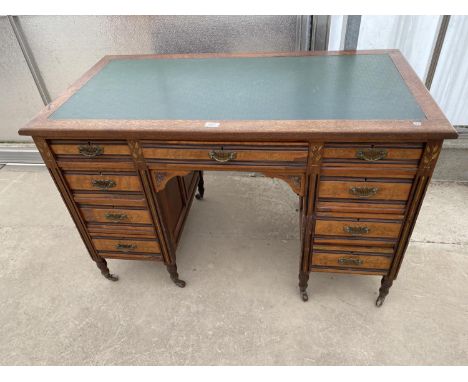 AN EDWARDIAN MAHOGANY DOUBLE PEDESTAL DESK ENCLOSING NINE DRAWERS, 48 X 25", BEARING MARRIS &amp; NORTON PAPER LABEL 