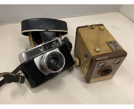 TWO CAMERAS TO INCLUDE A HALINA PAULETTE ELECTRIC FILM CAMERA AND A KODAK BROWNIE FLASH B 