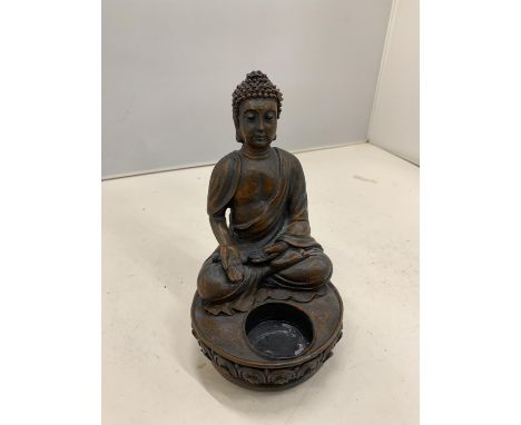 AN ASIAN STYLE TEA LIGHT HOLDER 