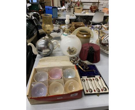 A MIXED GROUP TO INCLUDE A FEZ HAT, TWO TABLE LAMPS, STONEWARE VESSEL, A BOX OF OPALE CUPS AND SAUCERS, A STAINLESS STEEL AND