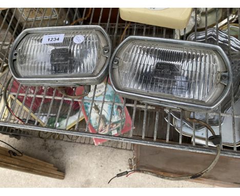 A PAIR OF VINTAGE LUCAS AUTOMOBILE LIGHTS 