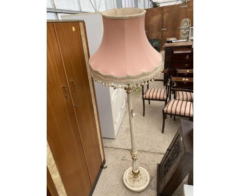 A MODERN STANDARD LAMP AND SHADE ON TURNED AND FLUTED COLUMN 