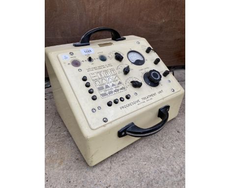 A VINTAGE PROGRESSIVE TREATMENT UNIT BEARING THE LABEL 'STANLEY COX LTD' 