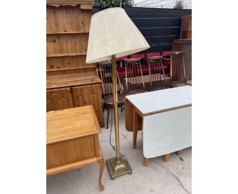 A MODERN BRASS STANDARD LAMP WITH SHADE 