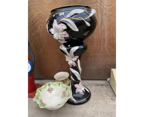 A LARGE BLACK AND FLORAL CERAMIC JARDINAIRE STAND AND TWO FURTHER CERAMIC BOWLS 
