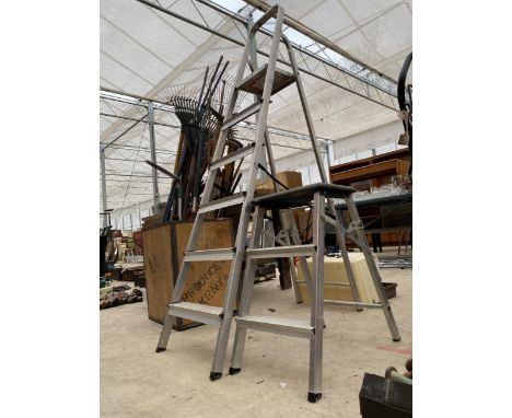 AN ALUMINIUM FIVE RUNG STEP LADDER AND A FURTHER SMALL KITCHEN STEP 
