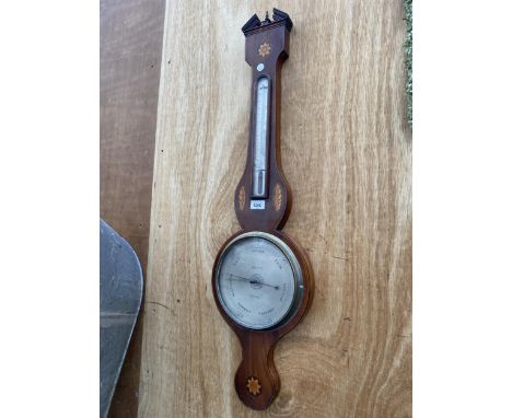 A DECORATIVE WOODEN CASED BAROMETER 