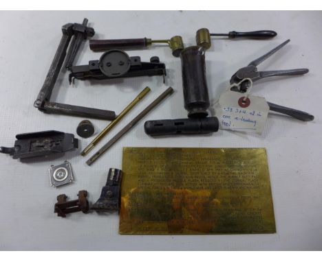 A .38 SMITH &amp; WESSON ALL IN ONE CLEANING TOOL, SHELL CASE, LOADING POWDER MEASURES, SIGHTS, TOOLS ETC 