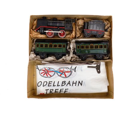 Märklin Zugpackung, Spur 0, Uhrwerk intakt, mit B-Dampflok R 880, Tender und 2 Personenwagen 1719, 1 tw rest., LS und gealter