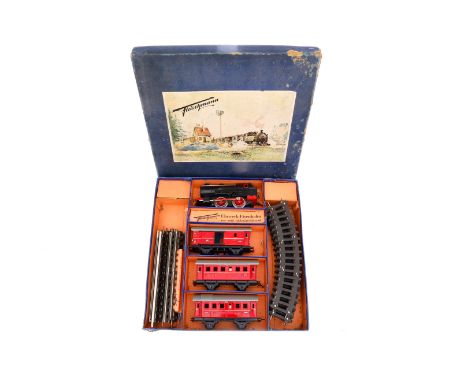 Fleischmann Zugpackung U 330/3 R, Spur 0, Uhrwerk intakt, mit Tenderlok, 3 Wagen und Schienenmaterial, Alterungsspuren, OK tw