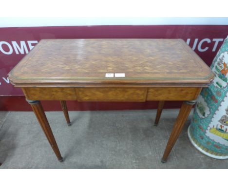 A 19th Century French rosewood and parquetry inlaid card table