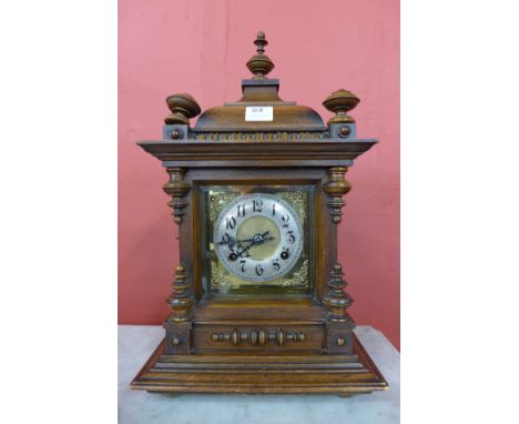A 19th Century American beech mantel clock