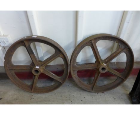 A pair of cast iron steam engine wheels