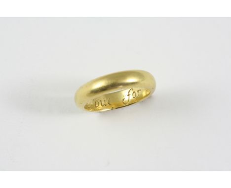 A GOLD POSY RING inscribed to the inside Love for ever, and stamped with the initials R.B. Size Q.