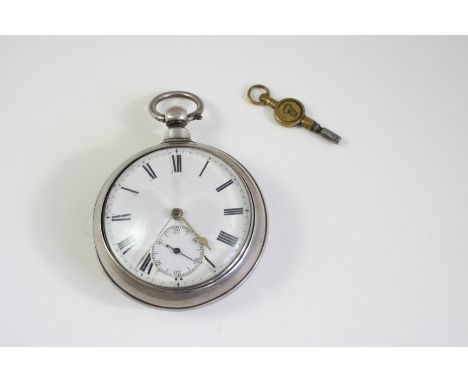 A SILVER PAIR CASED POCKET WATCH the white enamel dial with Roman numerals and subsidiary seconds dial, the movement signed W