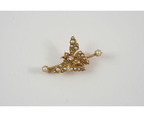 A VICTORIAN PEARL AND GEM SET BUTTERFLY BROOCH centred with a circular-cut diamond and set overall with graduated half pearls