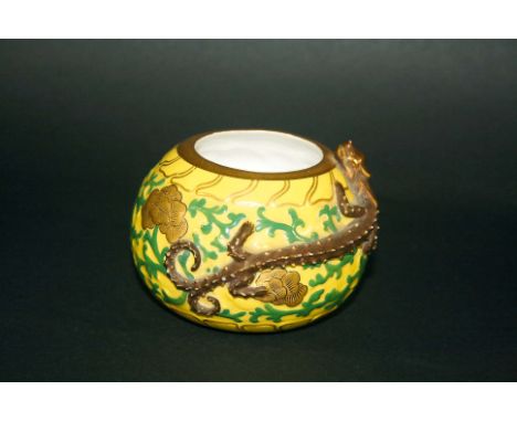 ROYAL WORCESTER LIZARD VASE the circular vase with green and gilt decoration on a yellow ground, and with a Lizard on one sid