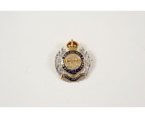 A DIAMOND AND ENAMEL REGIMENTAL BROOCH FOR THE ROYAL ENGINEERS set with rose-cut diamonds, with blue and red enamel decoratio