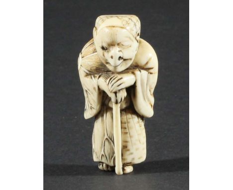 JAPANESE IVORY NETSUKE, of Tanuki disguised as a priest, Kyoto school, bears Masanao signature, height 5cm