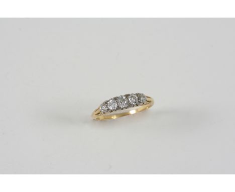 A DIAMOND FIVE STONE RING set with five graduated old brilliant-cut diamonds, in gold, size N, together with a 22ct. gold wed