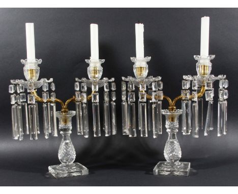 PAIR OF CUT GLASS AND GILT METAL CANDELABRA,  the pair of foliate branches with glass sconces, drip trays and lustres on balu